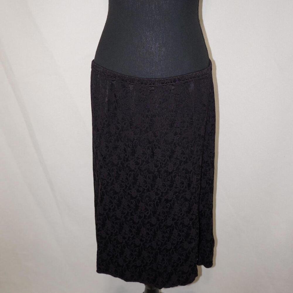 black CP Shades midi skirt with subtle floral pattern